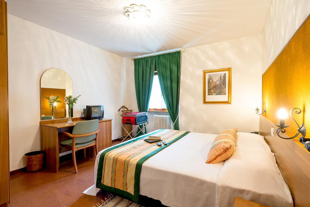 Albergo Altavilla Tirano Pokoj fotografie